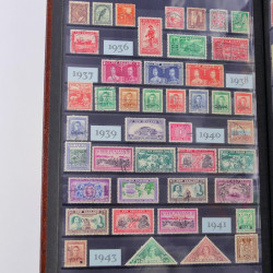 Lot de timbres de Nouvelle Zélande, Norvège neufs et oblitérés en un album.