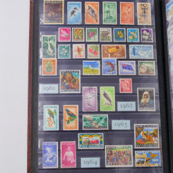 Lot de timbres de Nouvelle Zélande, Norvège neufs et oblitérés en un album.