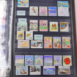 Lot de timbres de Nouvelle Zélande, Norvège neufs et oblitérés en un album.