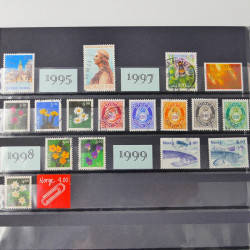 Lot de timbres de Nouvelle Zélande, Norvège neufs et oblitérés en un album.