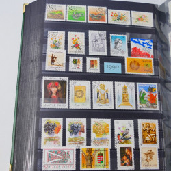 Lot de timbres d'Hongrie et Malte neufs et oblitérés en un album.