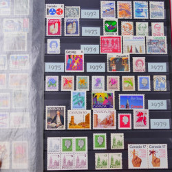 Lot de timbres de Canada et Mayotte neufs et oblitérés en un album.