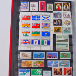 Lot de timbres de Canada et Mayotte neufs et oblitérés en un album.