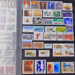 Lot de timbres de Canada et Mayotte neufs et oblitérés en un album.