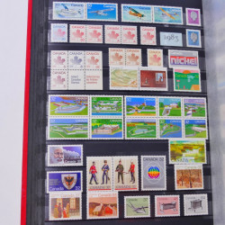 Lot de timbres de Canada et Mayotte neufs et oblitérés en un album.