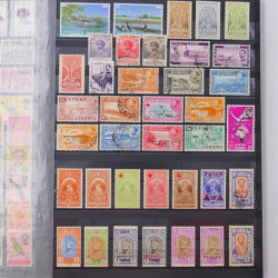 Lot de timbres d'Ethiopie et Dominique neufs et oblitérés en un album.