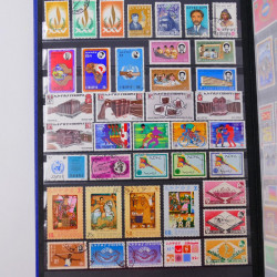 Lot de timbres d'Ethiopie et Dominique neufs et oblitérés en un album.