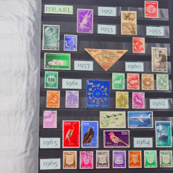 Lot de timbres de Tchécoslovaquie et Israël neufs et oblitérés en un album.