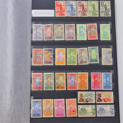 Lot de timbres de Dahomey et Niger neufs et oblitérés en un albums.