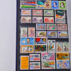 Lot de timbres de Dahomey et Niger neufs et oblitérés en un albums.