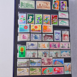 Lot de timbres de Dahomey et Niger neufs et oblitérés en un albums.