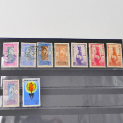 Lot de timbres de Dahomey et Niger neufs et oblitérés en un albums.