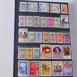 Lot de timbres de Dahomey et Niger neufs et oblitérés en un albums.