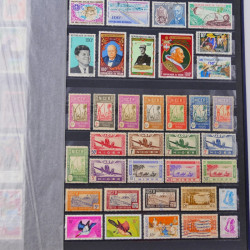 Lot de timbres de Dahomey et Niger neufs et oblitérés en un albums.