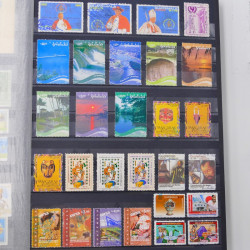 Lot de timbres Guatemala et Chili neufs et oblitérés en un album.