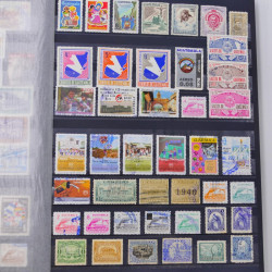 Lot de timbres Guatemala et Chili neufs et oblitérés en un album.