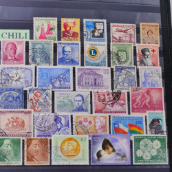 Lot de timbres Guatemala et Chili neufs et oblitérés en un album.