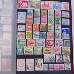 Lot de timbres Guatemala et Chili neufs et oblitérés en un album.