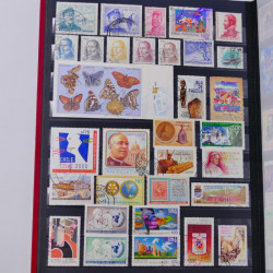 Lot de timbres Guatemala et Chili neufs et oblitérés en un album.