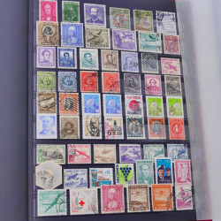 Lot de timbres Guatemala et Chili neufs et oblitérés en un album.