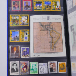 Lot de timbres de Venezuela et Papouasie neufs et oblitérés en un album.