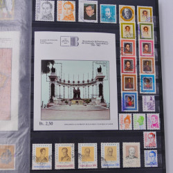 Lot de timbres de Venezuela et Papouasie neufs et oblitérés en un album.