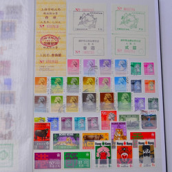 Lot de timbres de Hong Kong neufs et oblitérés en un album.
