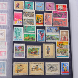 Lot de timbres de Vietnam neufs et oblitérés en un album.
