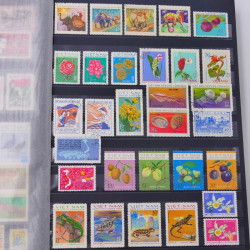 Lot de timbres de Vietnam neufs et oblitérés en un album.