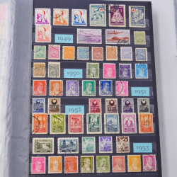 Lot massif de timbres du monde neufs et oblitérés en 8 albums.