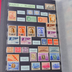 Lot massif de timbres du monde neufs et oblitérés en 8 albums.