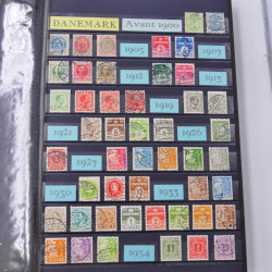 Lot massif de timbres du monde neufs et oblitérés en 8 albums.