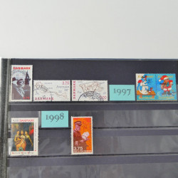 Lot massif de timbres du monde neufs et oblitérés en 8 albums.