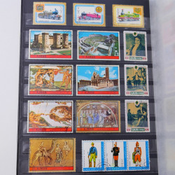 Lot massif de timbres du monde neufs et oblitérés en 9 albums.
