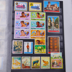 Lot massif de timbres du monde neufs et oblitérés en 9 albums.