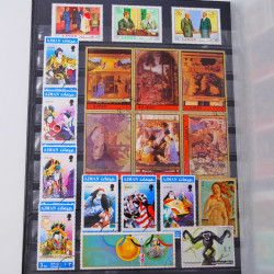 Lot massif de timbres du monde neufs et oblitérés en 9 albums.