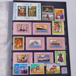 Lot massif de timbres du monde neufs et oblitérés en 9 albums.