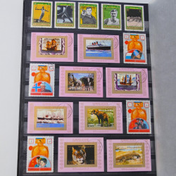 Lot massif de timbres du monde neufs et oblitérés en 9 albums.