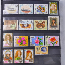 Lot massif de timbres du monde neufs et oblitérés en 9 albums.