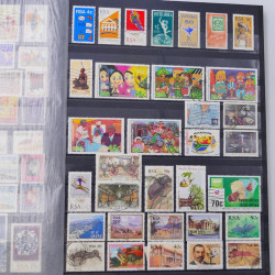 Lot massif de timbres du monde neufs et oblitérés en 10 albums.
