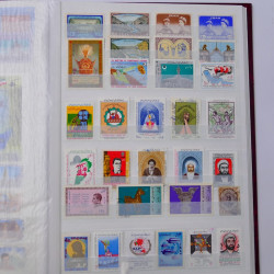Lot massif de timbres du monde neufs et oblitérés en 10 albums.