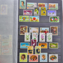 Lot de timbres de Jersey oblitérés en un album.
