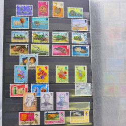 Lot de timbres de Jersey oblitérés en un album.
