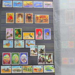 Lot de timbres de Jersey oblitérés en un album.