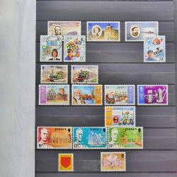 Lot de timbres de Jersey oblitérés en un album.