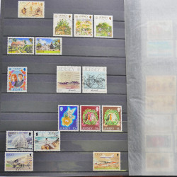 Lot de timbres de Jersey oblitérés en un album.