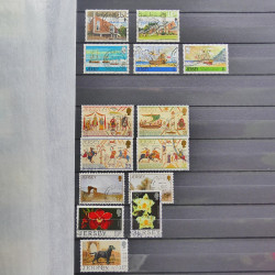 Lot de timbres de Jersey oblitérés en un album.