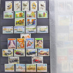 Lot de timbres de Jersey oblitérés en un album.