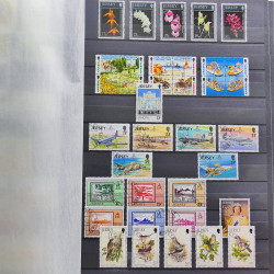 Lot de timbres de Jersey oblitérés en un album.