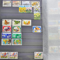 Lot de timbres de Jersey oblitérés en un album.